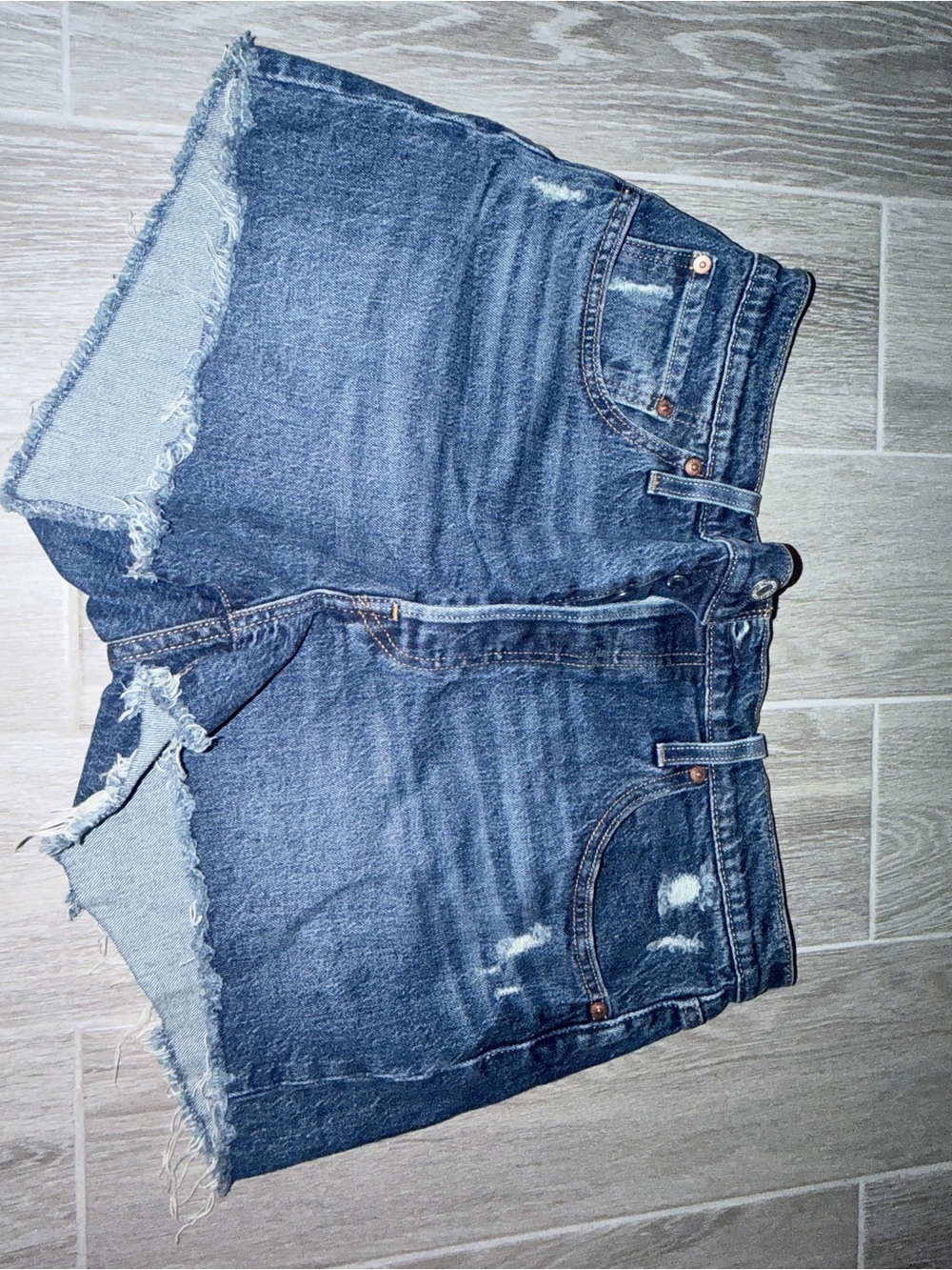 Levi's Distressed Dark Blue Denim Cutoff Shorts